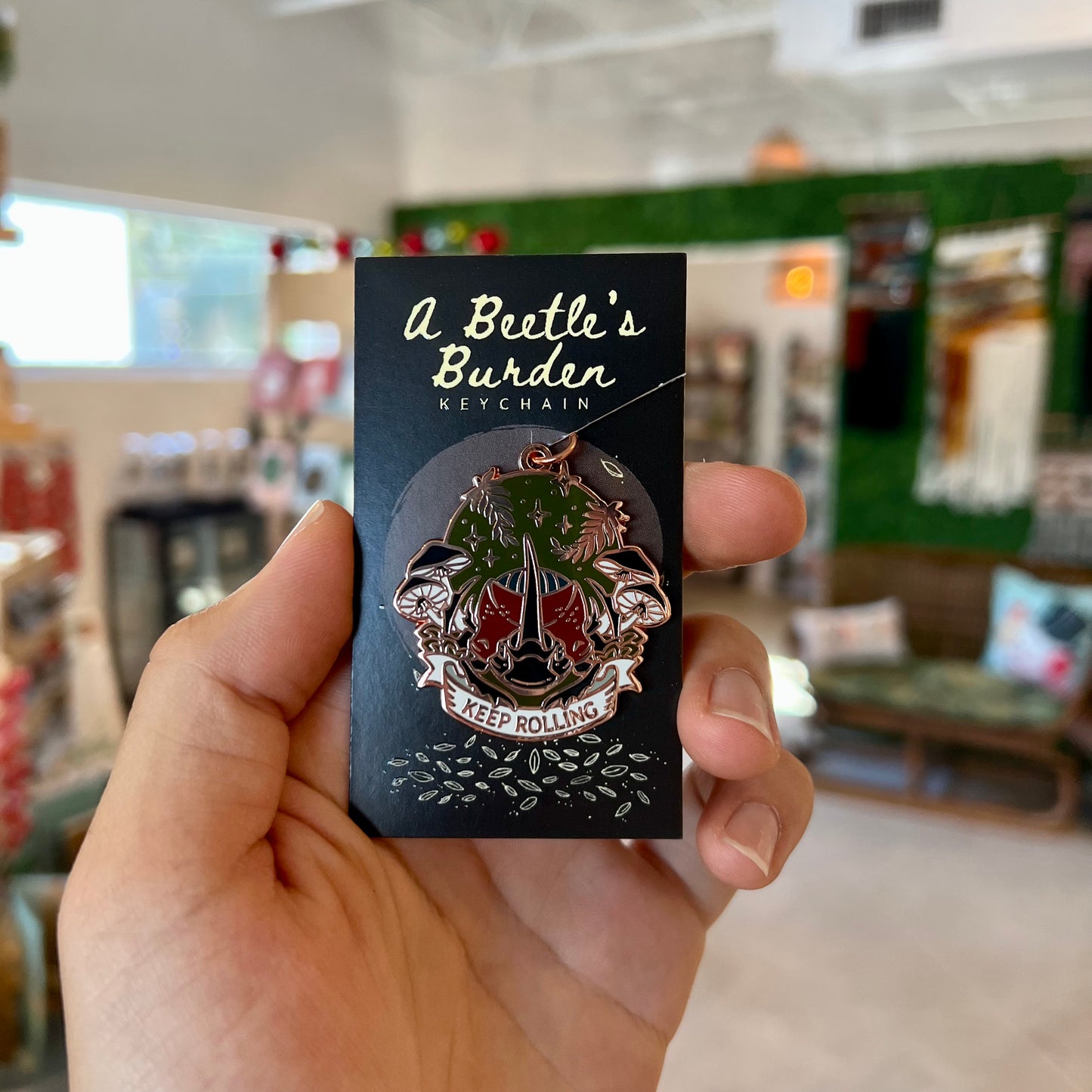 A Beetle’s Burden “Keep Rolling” Keychains